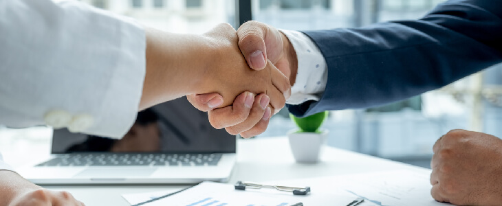 business man shaking hands with a private client